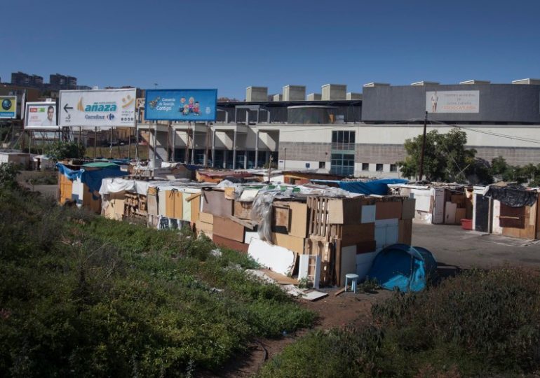 Waiters in Spain holiday hotspot forced to live in TENTS as tourist property boom sees slum-like shanty towns spring up