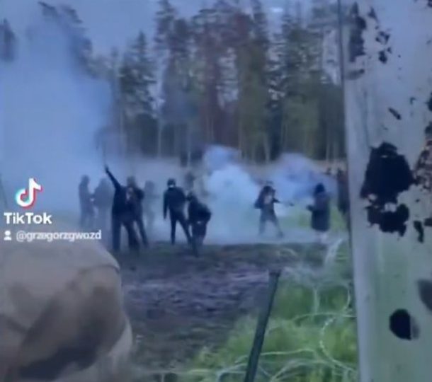 Horror moment migrants throw SPEARS at Polish border guards as officer killed by makeshift weapon at WW3 flashpoint