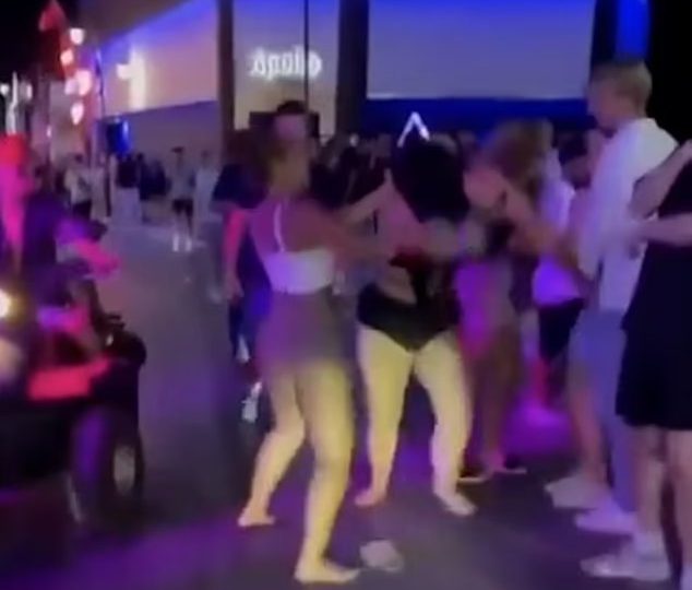 Shocking moment female Brit tourists brawl ‘over a MAN’ in party resort Malia as stunned crowd watches on