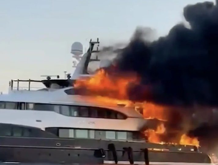 Moment £14million 150ft superyacht bursts into flames & sinks while anchored in paradise resort