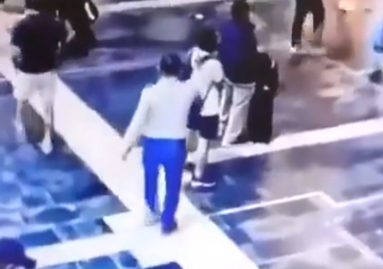 Horror moment coldblooded assassin executes rail passenger with gunshot to the head in packed station before walking off