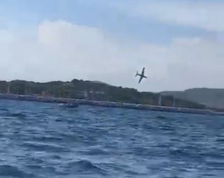 Horror moment plane CRASHES into sea during air show in France in front of stunned spectators