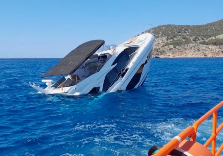 Watch moment luxurious yacht worth nearly £1million SINKS off coast of Majorca as five people rescued including child