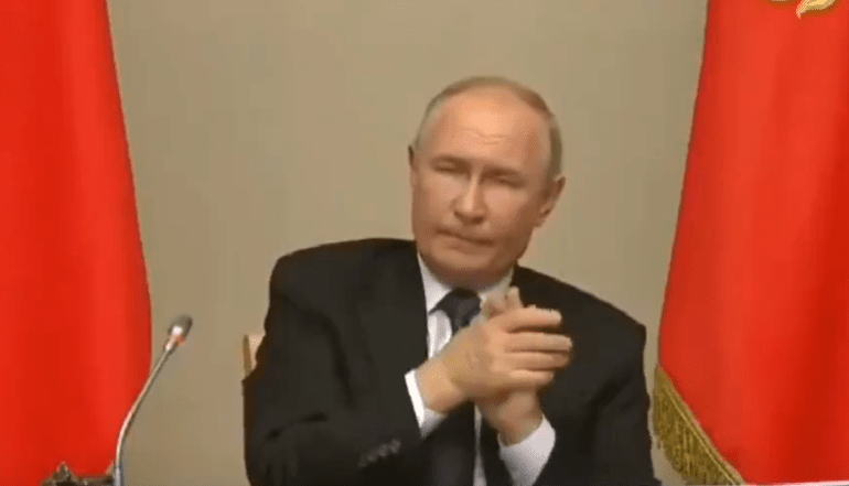 ‘Rattled’ Putin’s body language reveals deep fear over Ukraine invasion as he nervously twitches & rubs hands