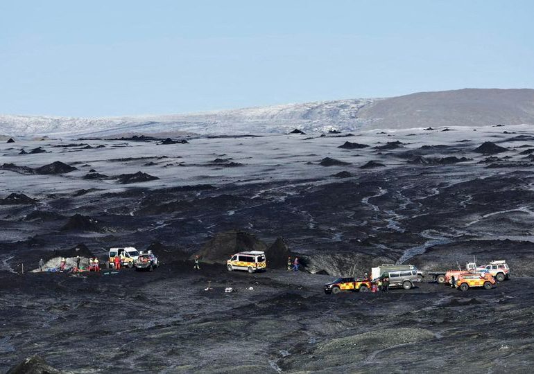 Frantic rescuers dig by hand to save tourists buried in Iceland glacier for 24 hours after deadly ice cave collapse