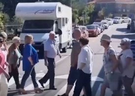 Watch moment anti-tourist campaigners continually use zebra crossing to block beachgoers in most BIZARRE protest yet