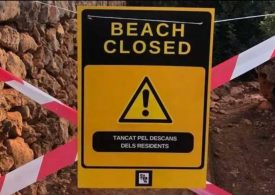 Anti-tourist fanatics tape off beaches with FAKE closure signs in Majorca to stop holidaymakers visiting popular coves