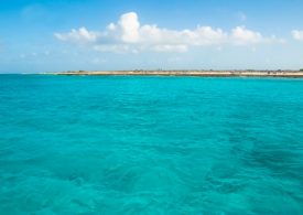 Inside desolate & isolated Caribbean island’s dark history with shipwrecks, graves and an abandoned lighthouse