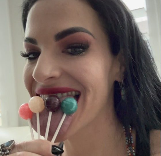 Woman claims record for world’s widest TONGUE measuring nearly 4 INCHES – and she can lick four lollipops at once