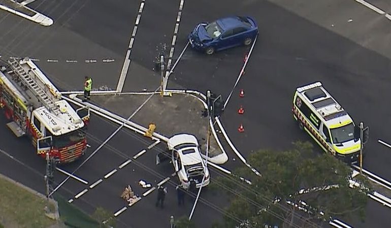 Multiple people including police officer injured in horror mass stabbing after car crash in Sydney