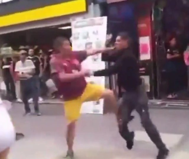 Watch moment porn star ‘King Midas’ brawls in street as girlfriend holds him back after shopper shouts ‘get a real job’