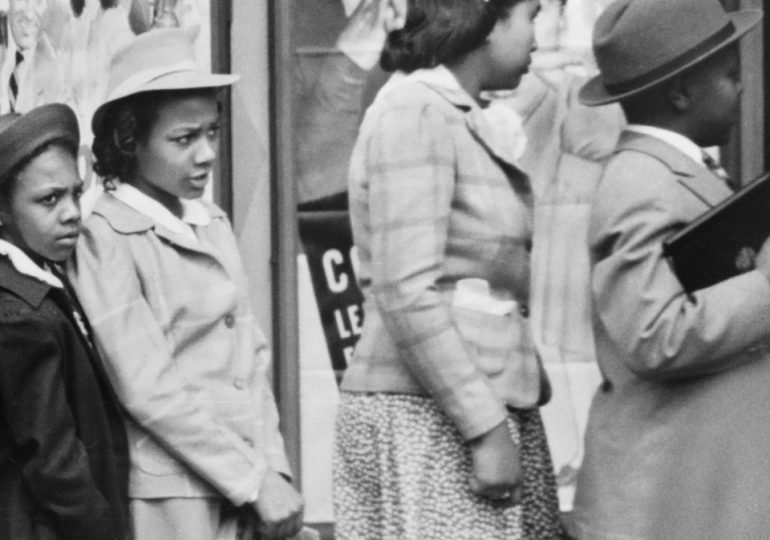 ‘Time-traveller’ spotted in 1941 photo carrying an IPAD sparks online frenzy as mystery boy stands in line at cinema