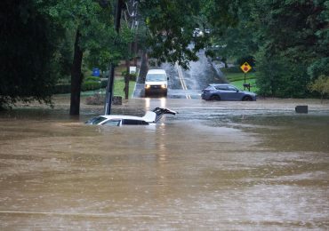 Watch: TV Reporter Stops Live Broadcast to Rescue Woman Trapped in Submerged Car