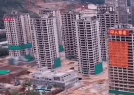 Watch moment 15 abandoned high rises are DEMOLISHED in just seconds after Chinese builders ‘ran out of money’