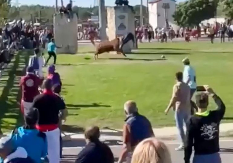 Horror moment raging bull impales runner with horns and tosses him around like ragdoll in front of Spanish festivalgoers