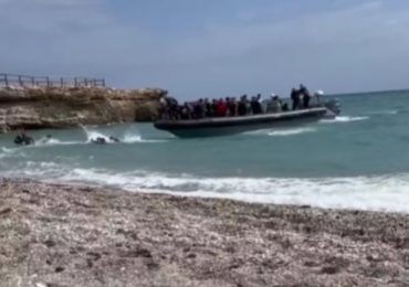 Brit tourists ‘traumatised’ as vid shows migrants land at Spanish beach before running past holidaymakers’ sunbeds