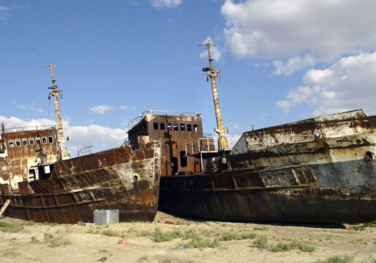 Inside the world’s ‘dry sea’ that became a rusting ship graveyard filled with disease and disturbing buildings