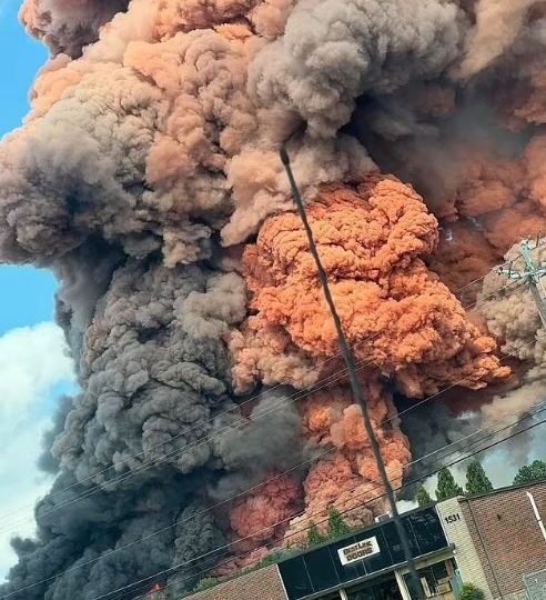 Terrifying moment smoke billows from burning chemical lab as massive fire sparks evacuations