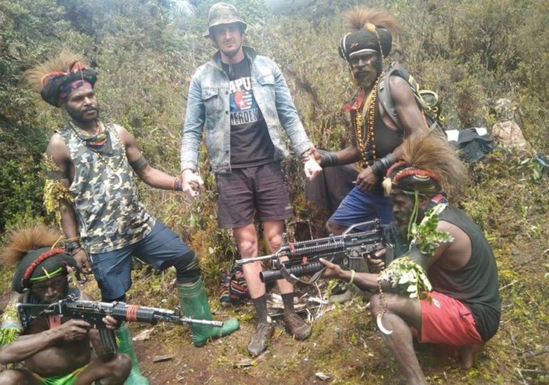 Pilot held captive by gun-wielding jungle rebels for 19-months finally FREED after fighters seized plane in West Papua