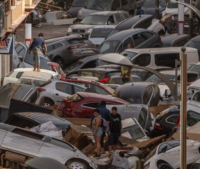 More rain pounds flood-blitzed Spain as Brit among 100s feared dead & rescuers face days finding bodies strewn in mud