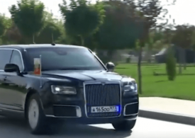 Moment Putin breaks bizarre law as he arrives for surprise axis-of-evil Iran summit in bomb-proof presidential limo