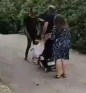 Shocking moment one-year-old girl is SLAPPED by furious man at Barcelona tourist hotspot as parents left horrified