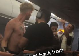 Moment ‘drunk’ easyJet passengers square off for midair brawl in aisle as captain pleads ‘you’re making things worse’