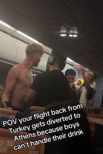 Moment ‘drunk’ easyJet passengers square off for midair brawl in aisle as captain pleads ‘you’re making things worse’