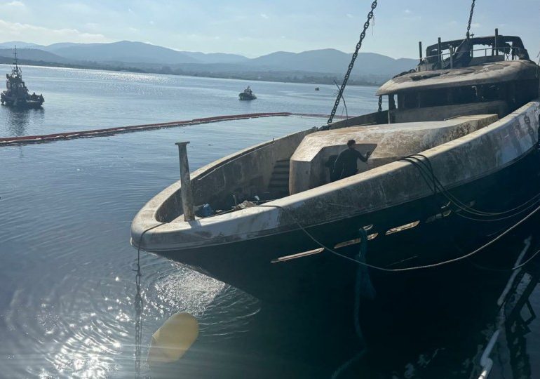 Incredible pics show wreck of £14m 150ft superyacht Atina raised from the depths after sinking in devastating fire