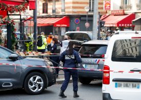 Knife-wielding man takes hostages in Paris pizza restaurant as armed special forces cops lock down street in siege