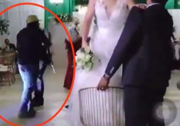 Watch horror moment gunman storms wedding reception just as bride is about to toss bouquet before shooting guest dead