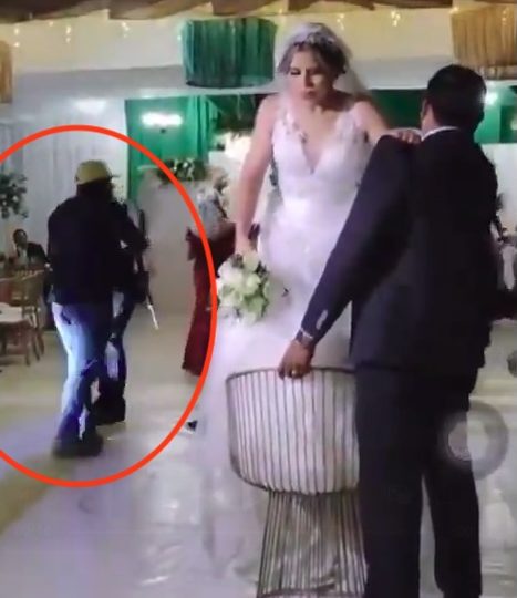 Watch horror moment gunman storms wedding reception just as bride is about to toss bouquet before shooting guest dead