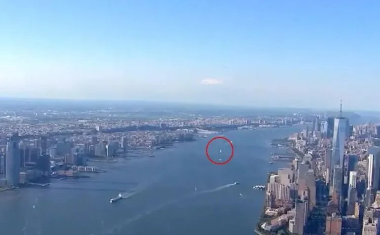 Eerie moment mysterious ‘UFO’ is caught on live TV as bizarre orb zooms past New York skyline in chopper cam footage