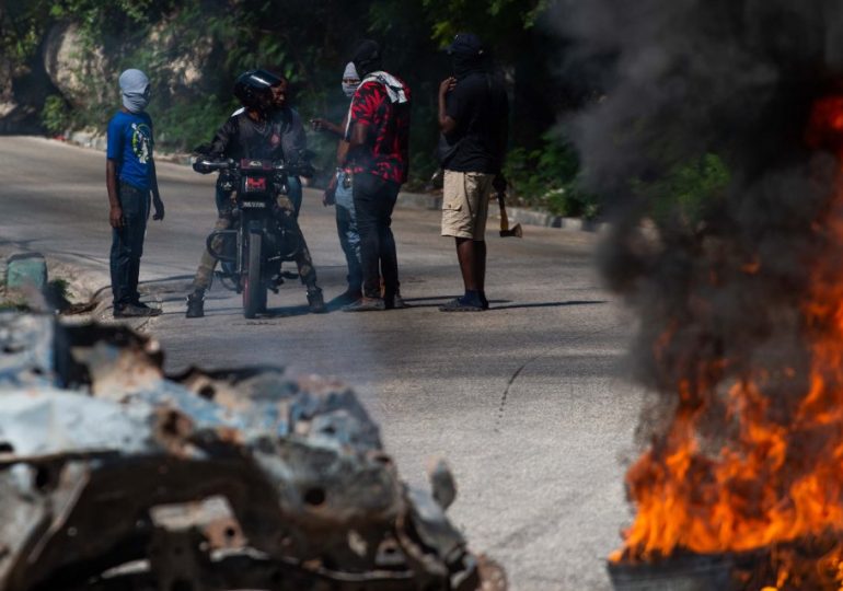 Vigilantes chop up mobsters & burn bodies in ‘world’s most dangerous city’ after Haiti warlord ‘Barbecue’ vows coup