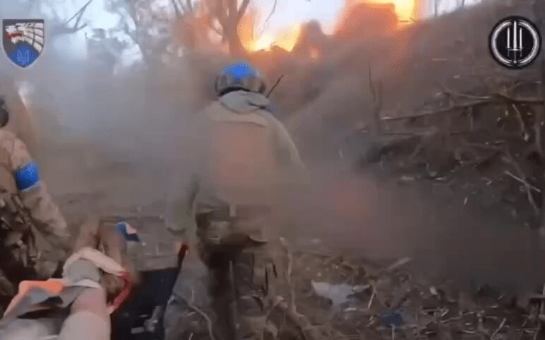 ‘Hearts of gold, balls of titanium’: Watch fearless Ukrainian special forces evacuate wounded comrade under shell fire