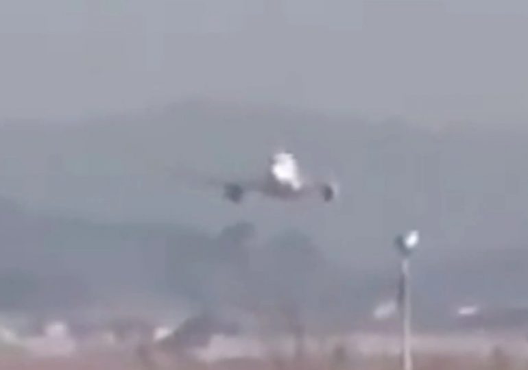 Terrifying footage shows doomed plane hurtling head on to concrete wall before bursting into flames killing 179 onboard