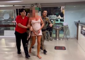 Moment Brit woman is arrested ‘for romping on table & breaking it in hotel lobby’ before spending Xmas in Thai jail