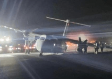 Moment plane spits flames in ANOTHER horror landing as two more aircraft malfunction on same night as South Korea crash