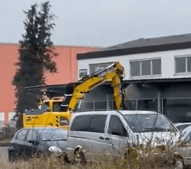 Watch terrifying moment stolen digger goes on RAMPAGE as armed cops shot driver dead in chaotic footage