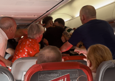 Watch moment drunken passengers brawl on Jet2 flight to Leeds as one tries to ‘bite the other’s neck & gouge eyes out’