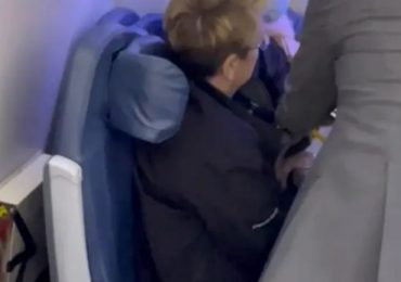 Watch moment female stowaway, 57, is snared after making it across the ATLANTIC having sneaked through airport unnoticed