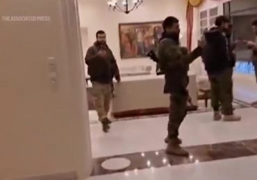 Watch Syrian rebels storm Assad’s palace and rifle through dictator’s bedroom drawers after seizing second city Aleppo