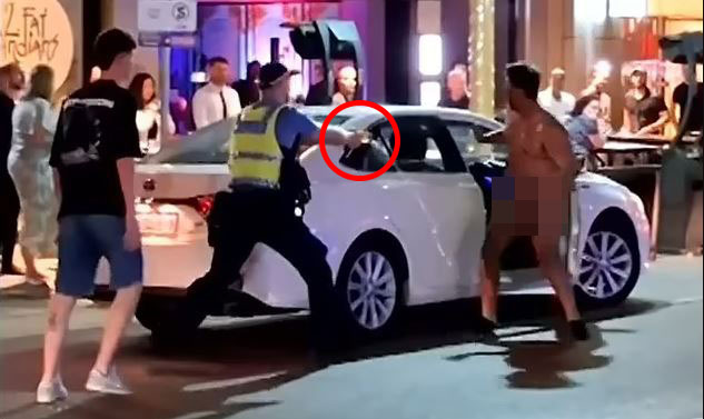 Watch wild moment NAKED man is tasered & left shrieking after going on a late-night street rampage in just his socks