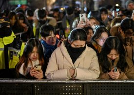 Watch haunting moment mourning South Korea marks New Year with SILENT crowds after plane disaster and ‘coup’ drama