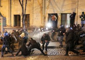 Riot cops fire tear gas at Georgia protesters hurling fireworks in 3rd night of violence against ‘pro-Putin’ regime