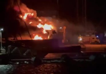 Horror moment £12MILLION luxury superyacht erupts into flames & is destroyed while anchored in paradise resort