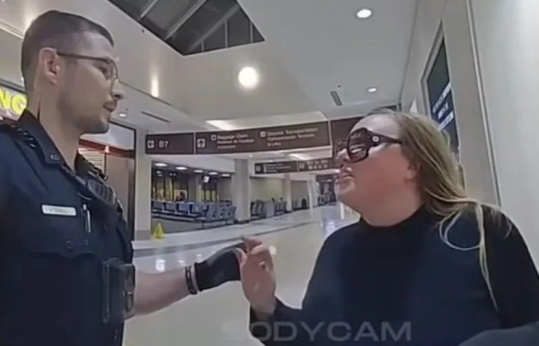 Watch moment female BBC comic Rachel Jackson has huge airport meltdown snarling at cop and screaming ‘I am Titanic’