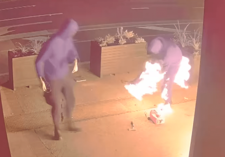 Watch moment bungling arsonist sets his own TROUSERS on fire & has to ditch them as he hot-foots from crime scene