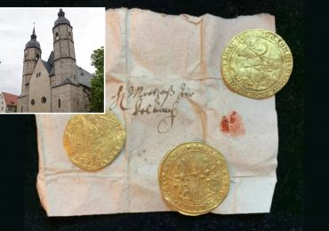 Mysterious 400-year-old cache of ancient treasure found hidden crammed inside leg of STATUE in church