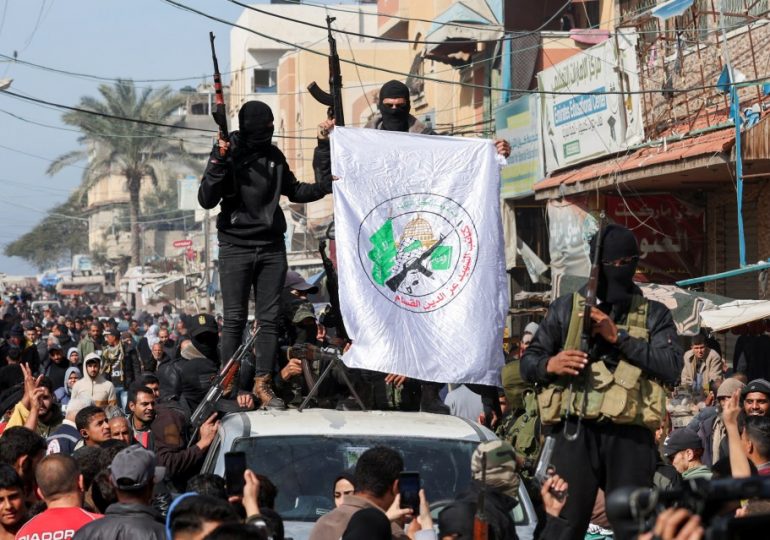 Shameless AK-47-wielding Hamas terrorists come out of hiding to throw PARADE on dawn of Gaza ceasefire & hostage release